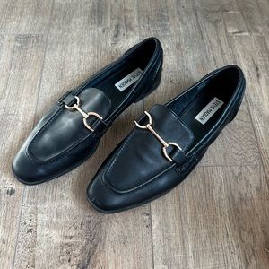 Steve Madden black loafers with gold buckle